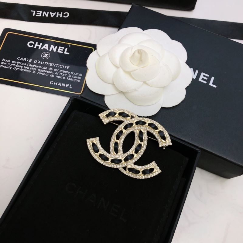 Ch*el brooches